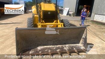 Retro Escavadeira New Holland B95B