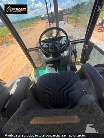 Retro Escavadeira New Holland B110B