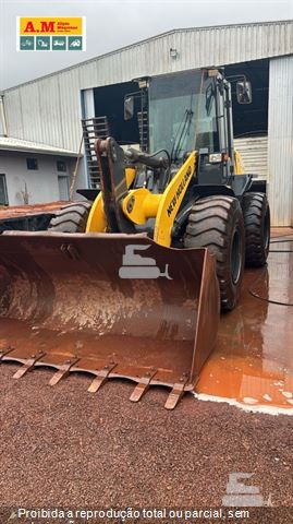 Pá Carregadeira New Holland W130 B